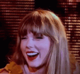 taylor-swift-heart-fingers-meme-aknsj2dhk7ge3cid.gif